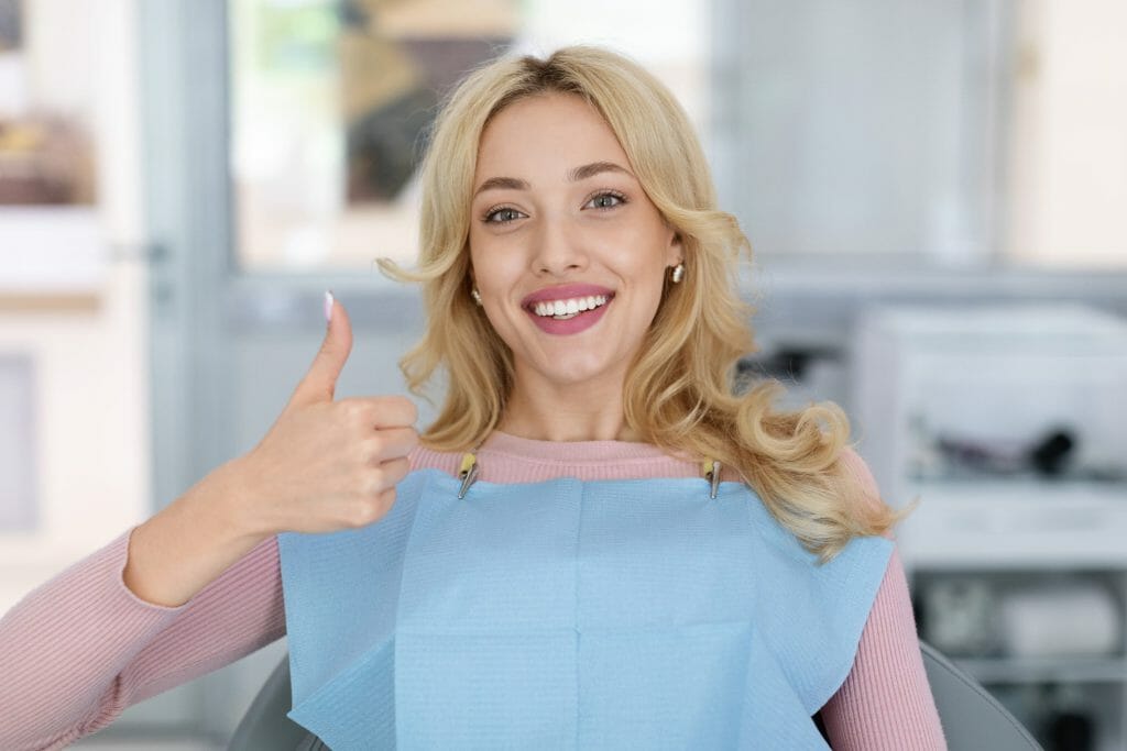 woman smiling at the dentist